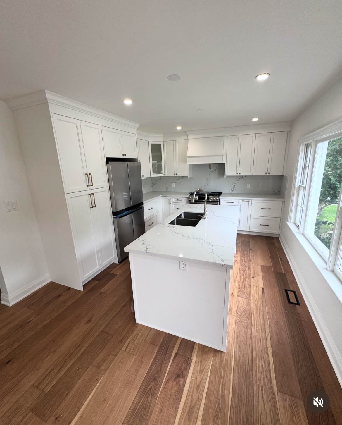 A completed Black Oak kitchen renovation with warm oak cabinetry